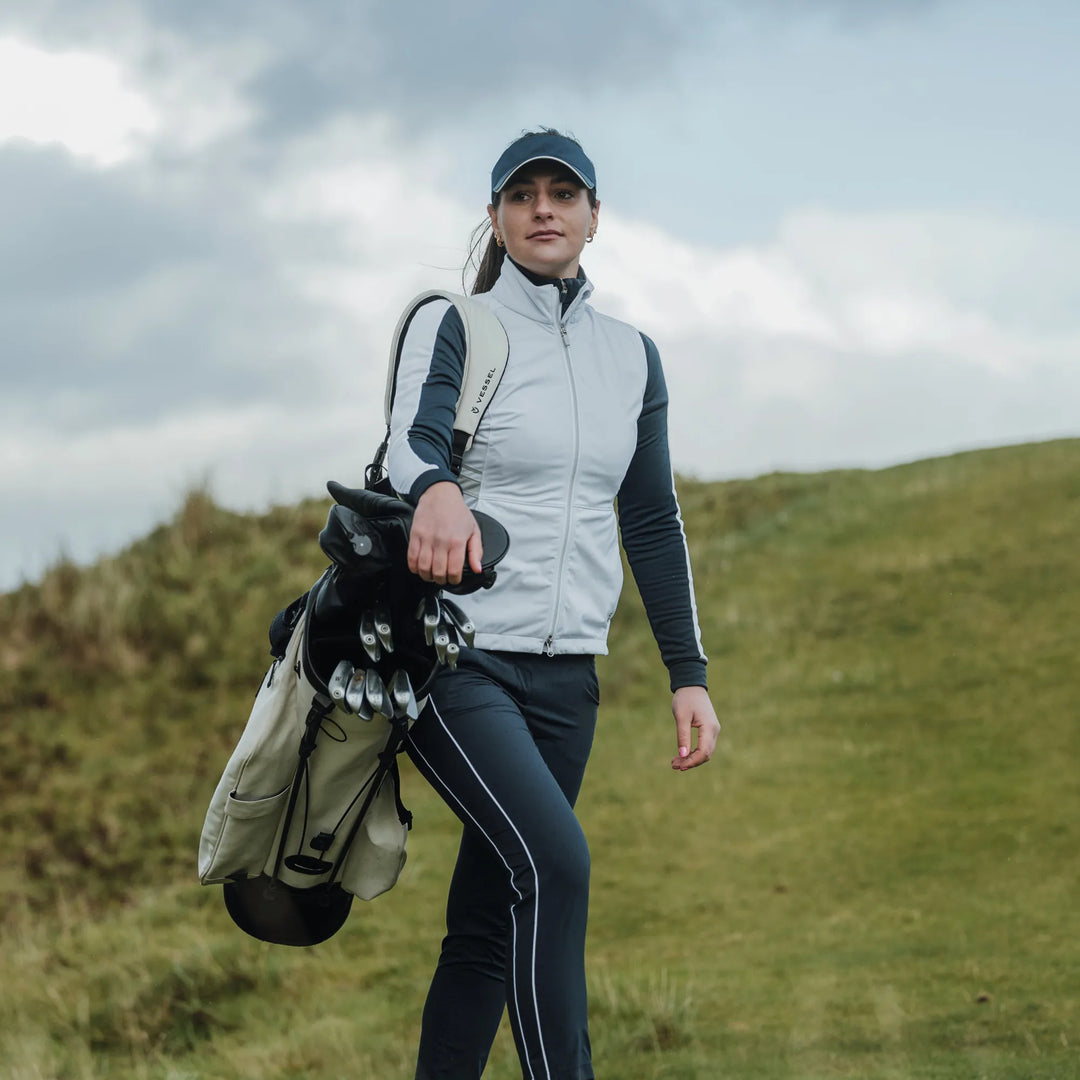 Lea is a Windproof and water repellent golf vest for Women in the color White/Cool Grey(9)