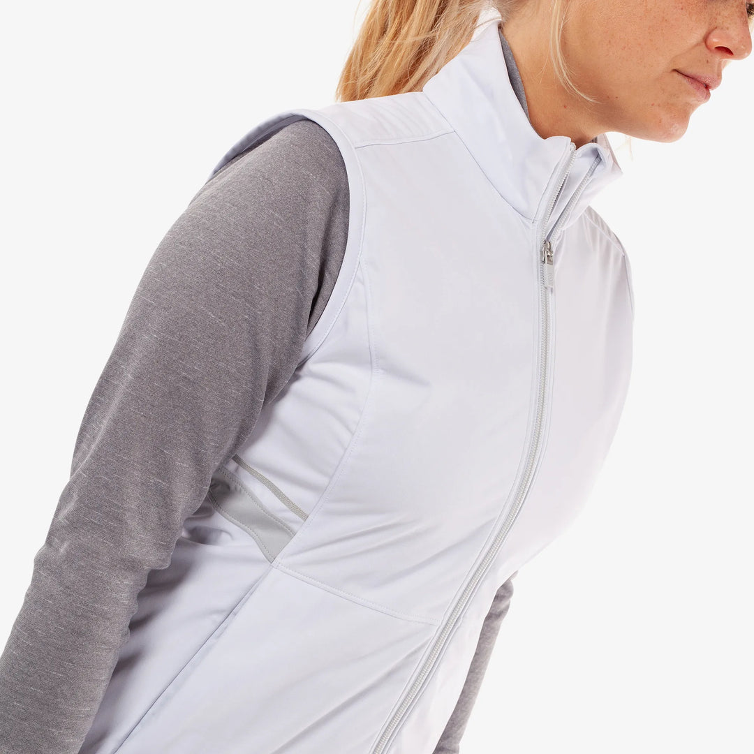 Lea is a Windproof and water repellent golf vest for Women in the color White/Cool Grey(3)