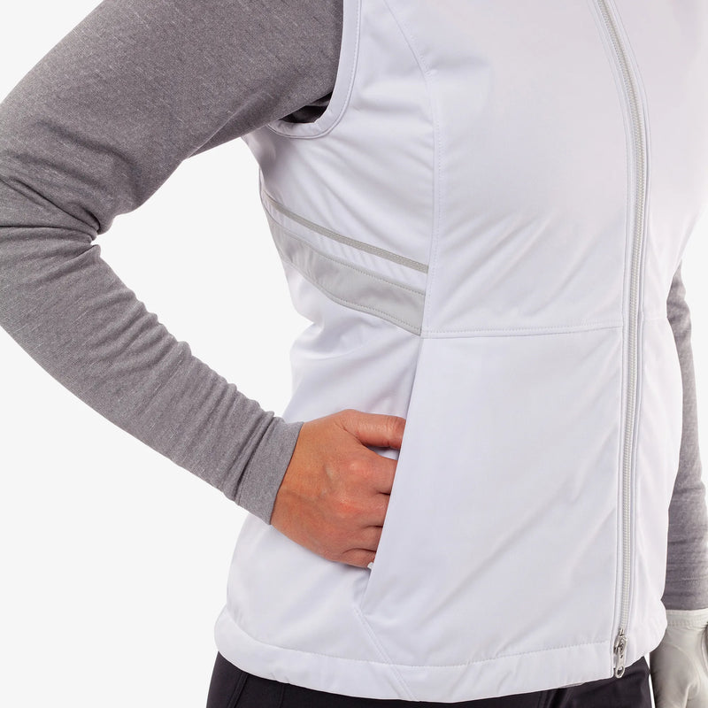 Lea is a Windproof and water repellent golf vest for Women in the color White/Cool Grey(4)
