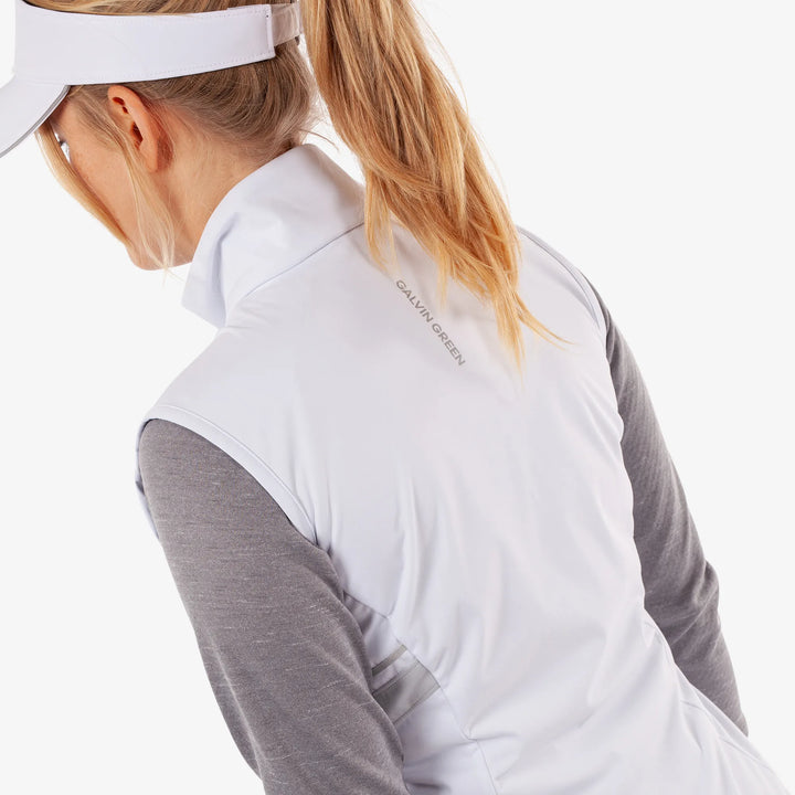 Lea is a Windproof and water repellent golf vest for Women in the color White/Cool Grey(6)