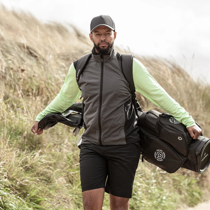 Leo is a Windproof and water repellent golf vest for Men in the color Forged Iron/Black (9)