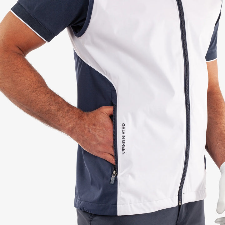 Leo is a Windproof and water repellent golf vest for Men in the color White/Navy(4)