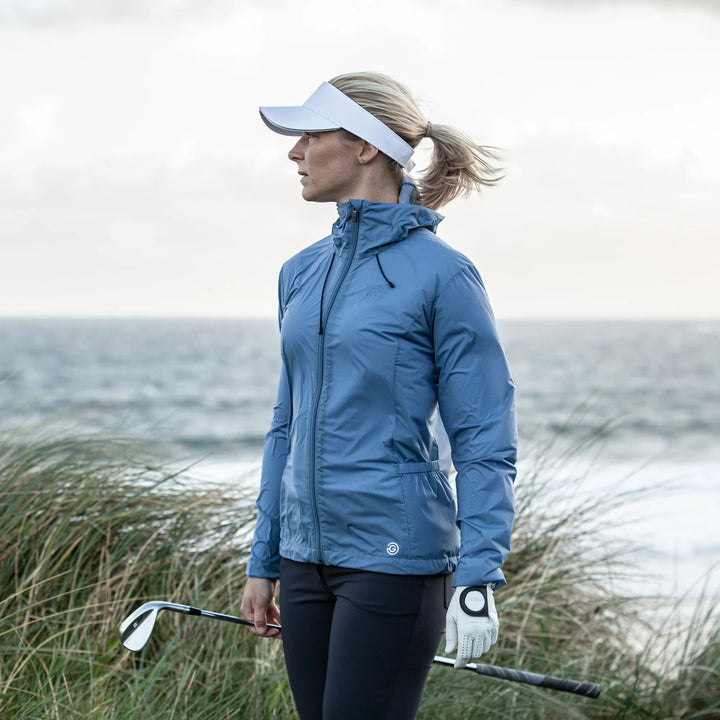Lilly is a Windproof and water repellent golf jacket for Women in the color Moonlight Blue(12)