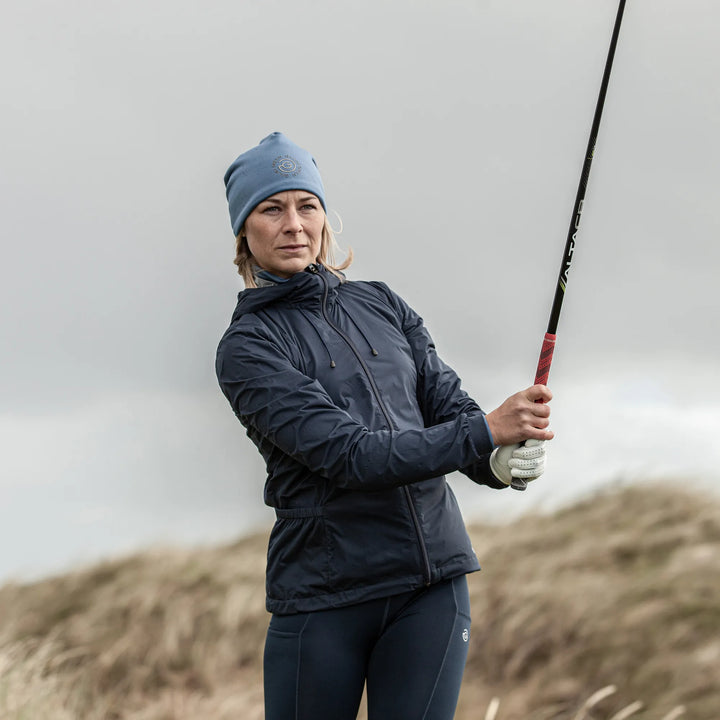 Lilly is a Windproof and water repellent golf jacket for Women in the color Navy(12)