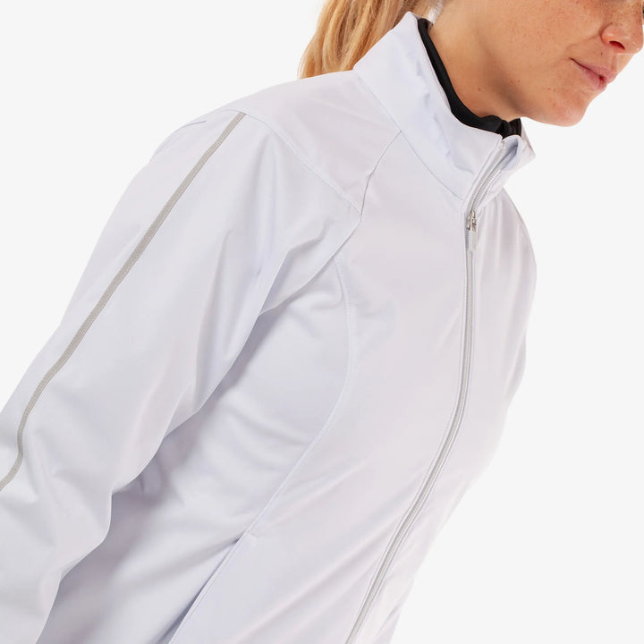 Lissy is a Windproof and water repellent golf jacket for Women in the color White/Cool Grey(3)