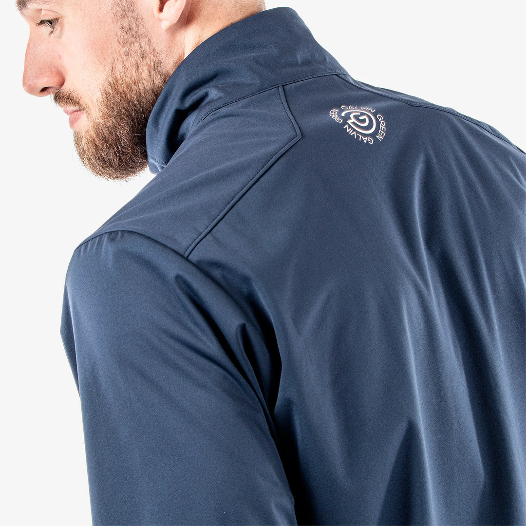 Livingston is a Windproof and water repellent golf jacket for Men in the color White/Navy/Orange(6)