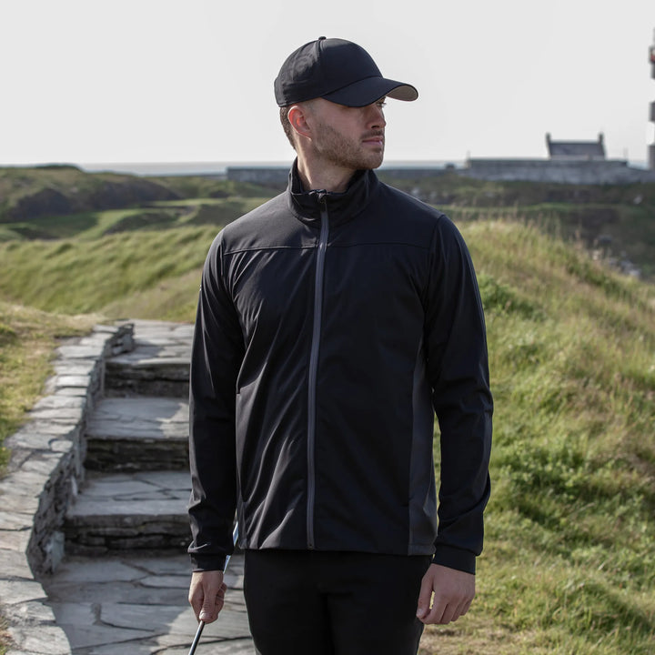 Lloyd is a Windproof and water repellent golf jacket for Men in the color Black/Forged Iron(9)