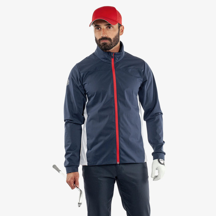 Lloyd is a Windproof and water repellent golf jacket for Men in the color Navy/Red/White(1)