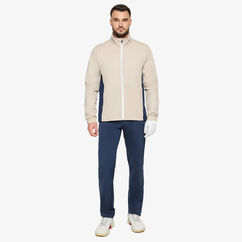 Lloyd is a Windproof and water repellent golf jacket for Men in the color Sand/Navy/white(2)