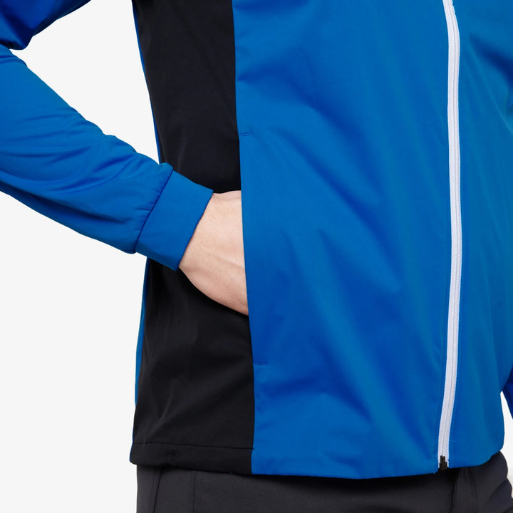 Lloyd is a Windproof and water repellent golf jacket for Men in the color Royal Blue/Black(3)
