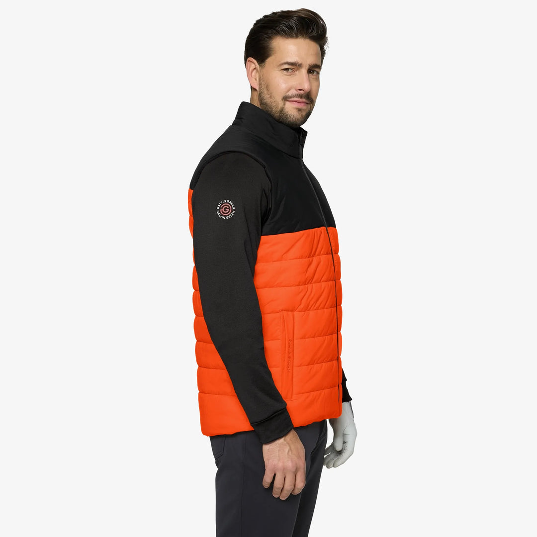 Luca is a Windproof and water repellent golf vest for Men in the color Orange/Black(3)