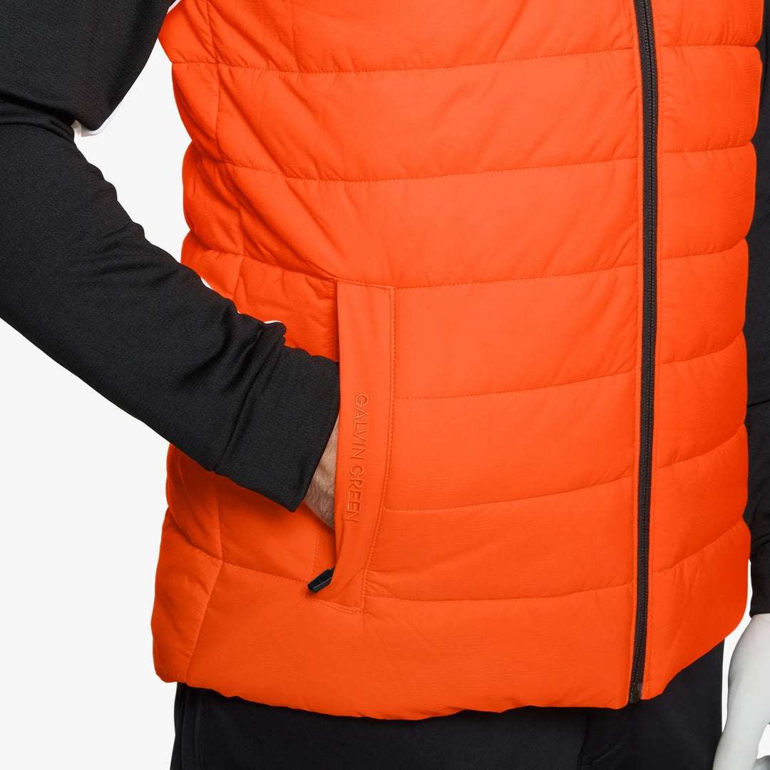 Luca is a Windproof and water repellent golf vest for Men in the color Orange/Black(4)