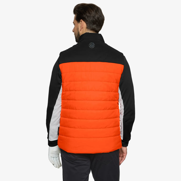 Luca is a Windproof and water repellent golf vest for Men in the color Orange/Black(5)