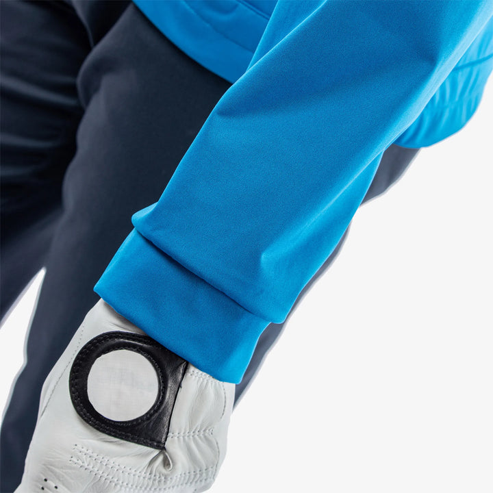 Lucien is a Windproof and water repellent golf jacket for Men in the color Blue/White/Cool Grey(6)
