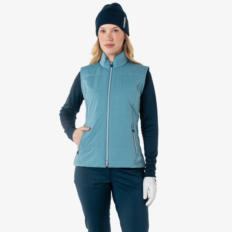 Luna is a Windproof and water repellent golf vest for Women in the color Storm Blue(1)