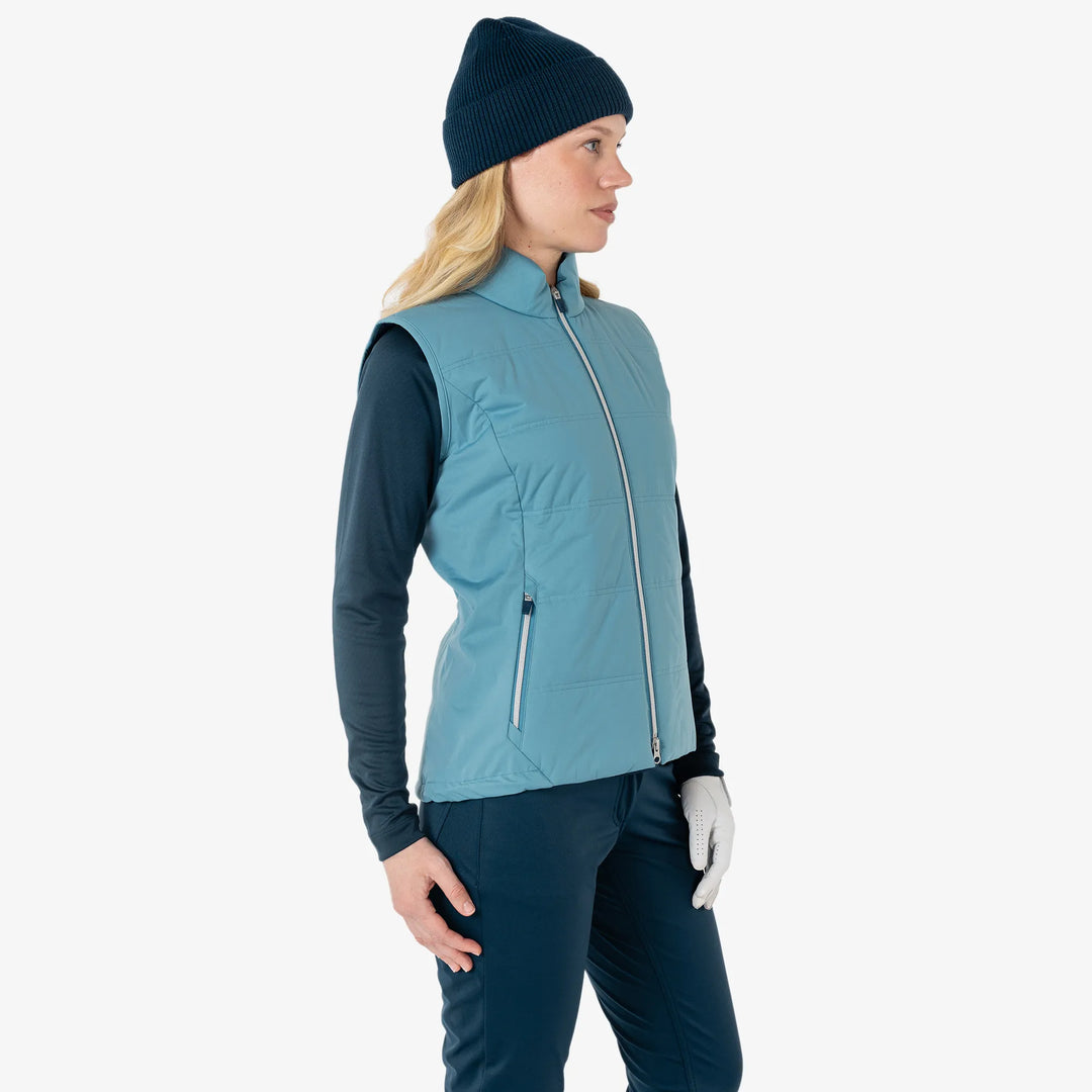 Luna is a Windproof and water repellent golf vest for Women in the color Storm Blue(3)
