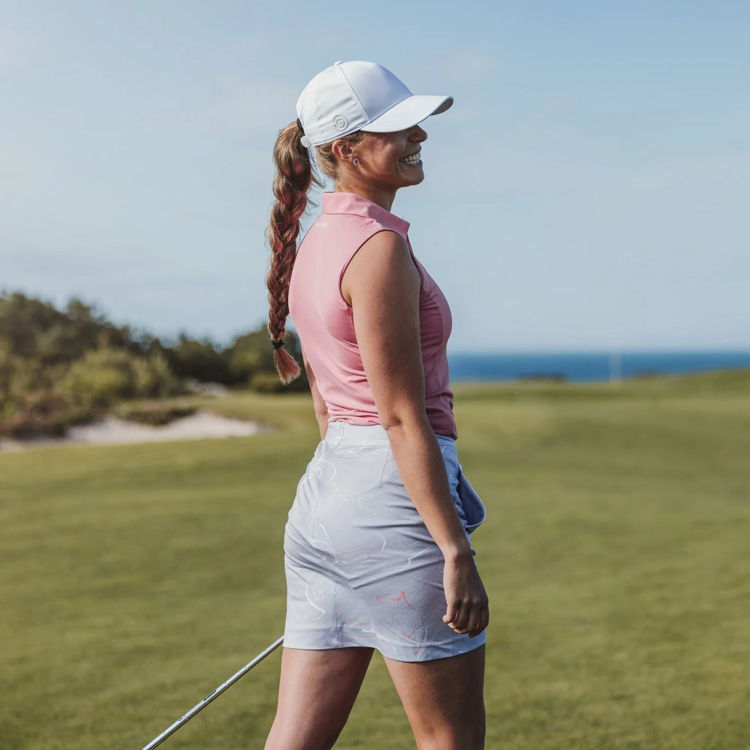 Mabel is a Breathable golf skirt with inner shorts for Women in the color Cool Grey/Coral/White(7)