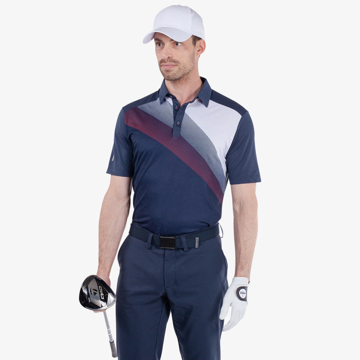 Macoy is a Breathable short sleeve golf shirt for Men in the color Navy/Red(1)