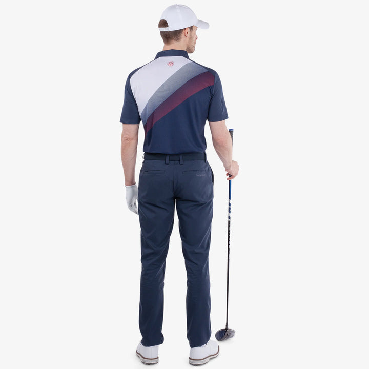 Macoy is a Breathable short sleeve golf shirt for Men in the color Navy/Red(6)
