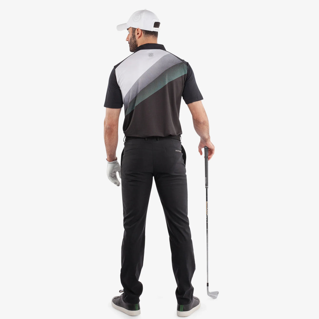 Macoy is a Breathable short sleeve golf shirt for Men in the color Black/Atlantis Green(5)