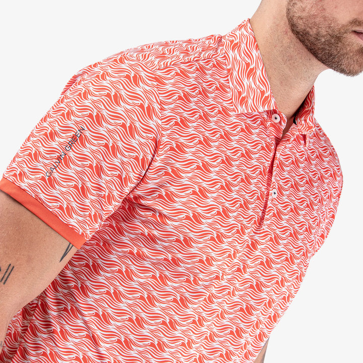 Madden is a Breathable short sleeve golf shirt for Men in the color Orange/White(3)