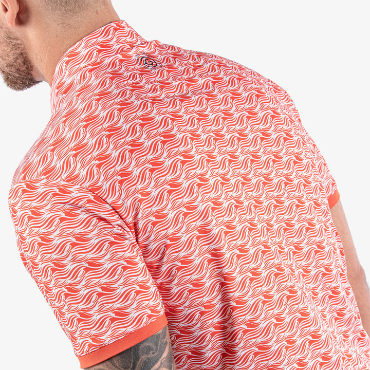 Madden is a Breathable short sleeve golf shirt for Men in the color Orange/White(6)