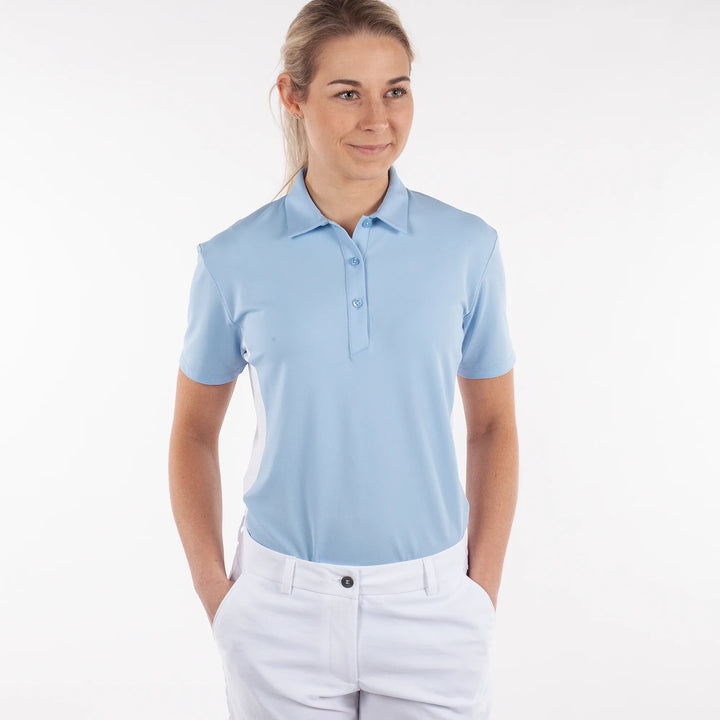Maia is a Breathable short sleeve golf shirt for Women in the color Blue Bell(1)