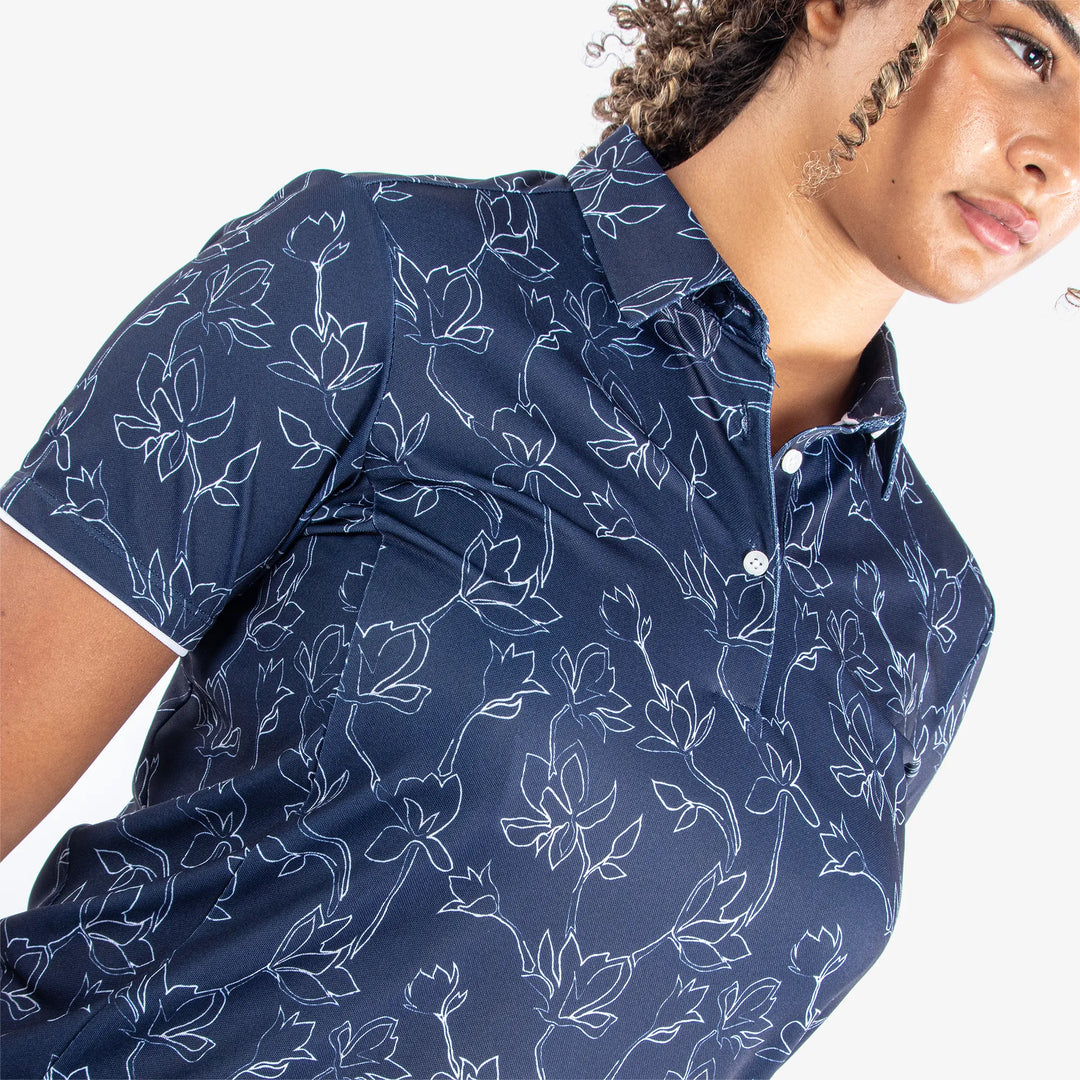 Mallory is a Breathable short sleeve golf shirt for Women in the color Navy/White(3)