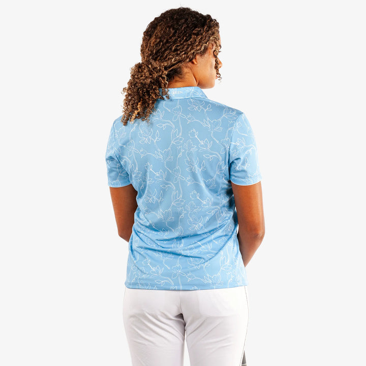 Mallory is a Breathable short sleeve golf shirt for Women in the color Alaskan Blue/White(4)