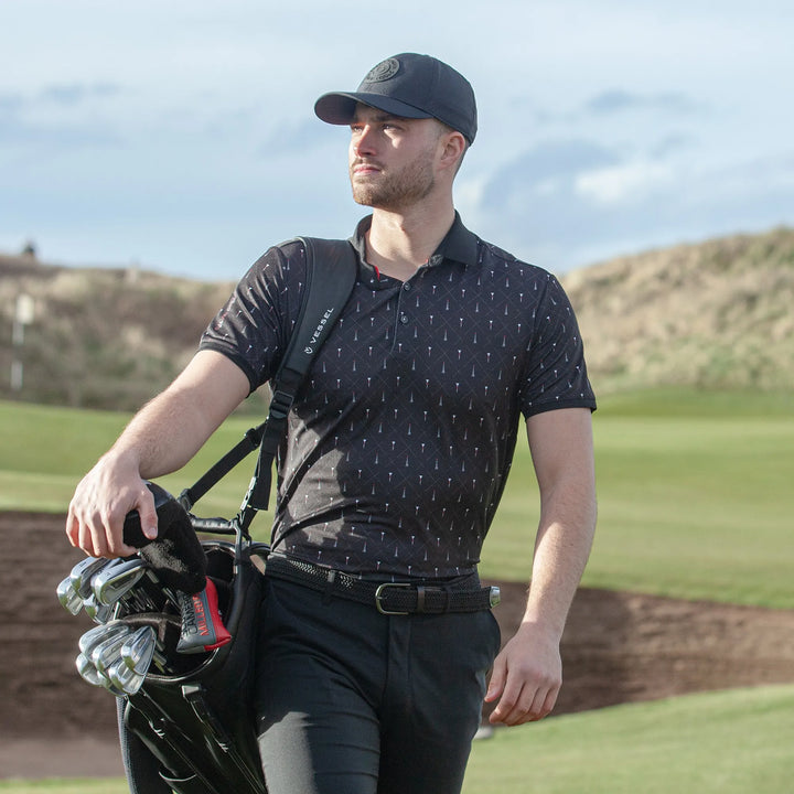 Manolo is a Breathable short sleeve golf shirt for Men in the color Black/White/Red(10)