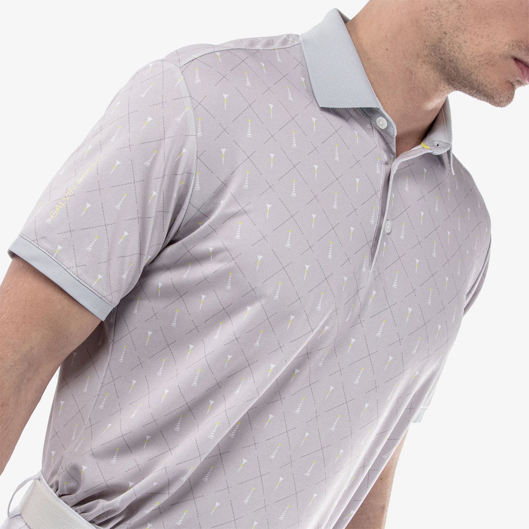 Manolo is a Breathable short sleeve golf shirt for Men in the color Cool Grey/White/Sunny Lime(3)