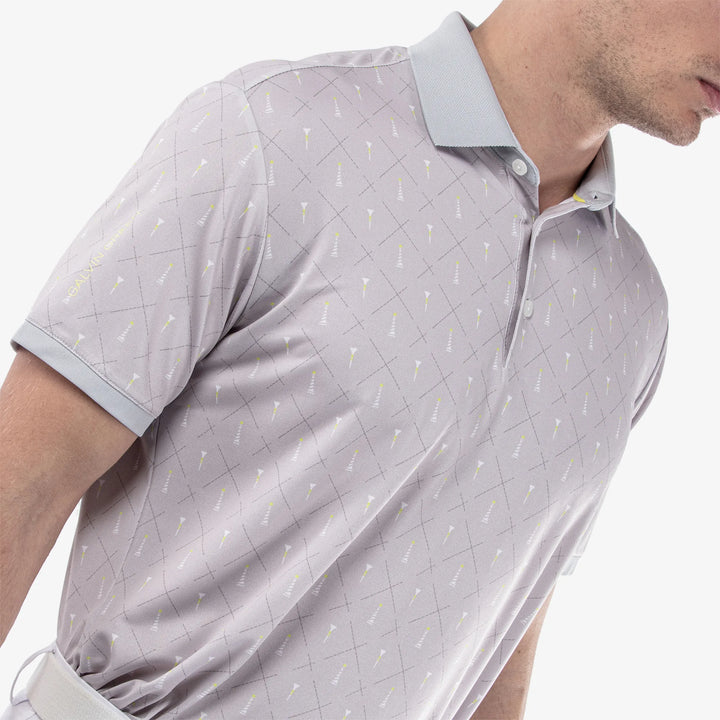 Manolo is a Breathable short sleeve golf shirt for Men in the color Cool Grey/White/Sunny Lime(3)