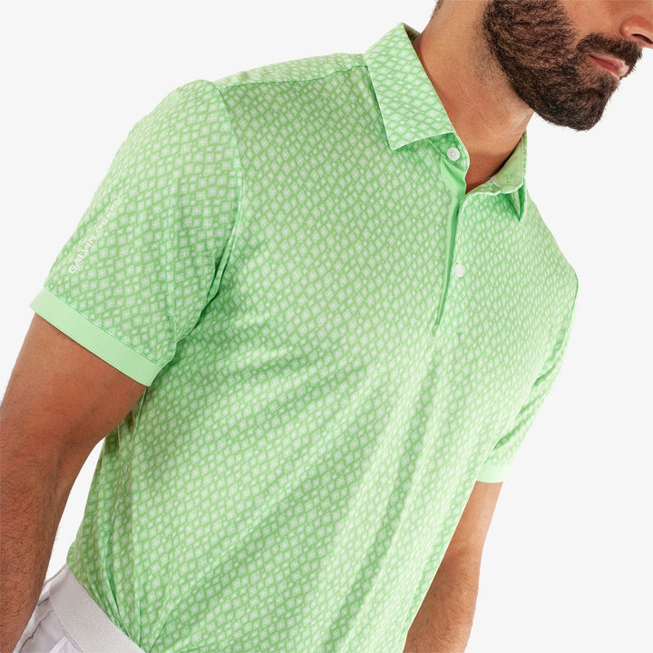 Manuel is a Breathable short sleeve golf shirt for Men in the color Fresh Green/White(3)