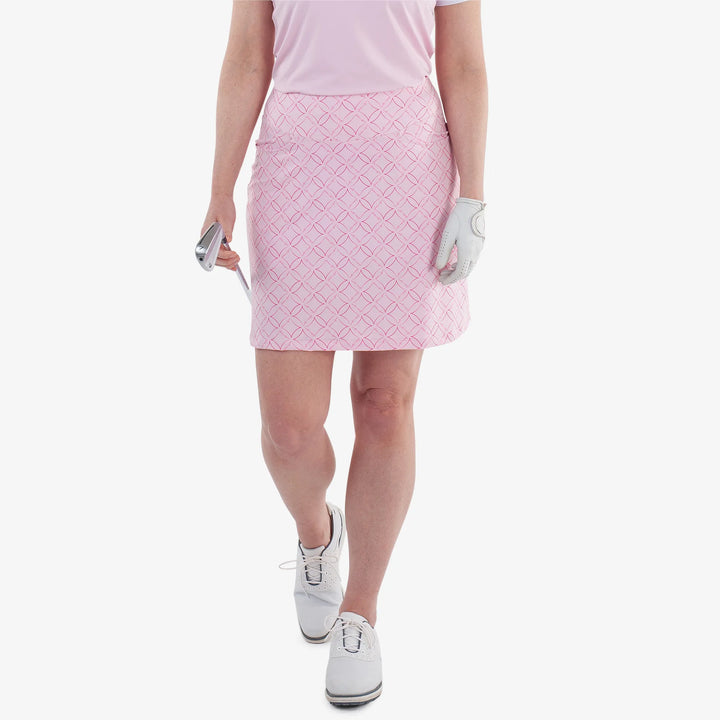 Marielle is a Breathable golf skirt with inner shorts for Women in the color Pink/Fuchsia(1)