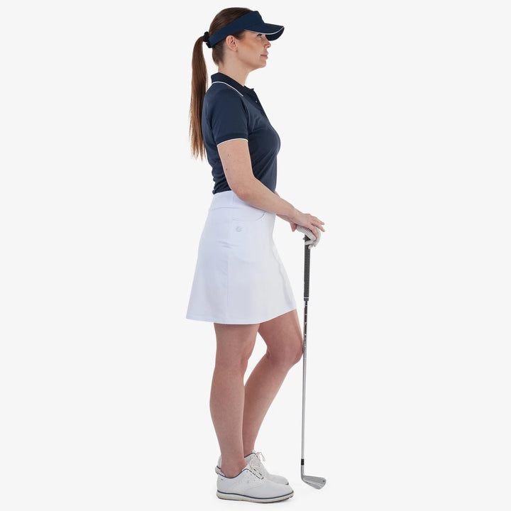 Marielle is a Breathable golf skirt with inner shorts for Women in the color White(4)