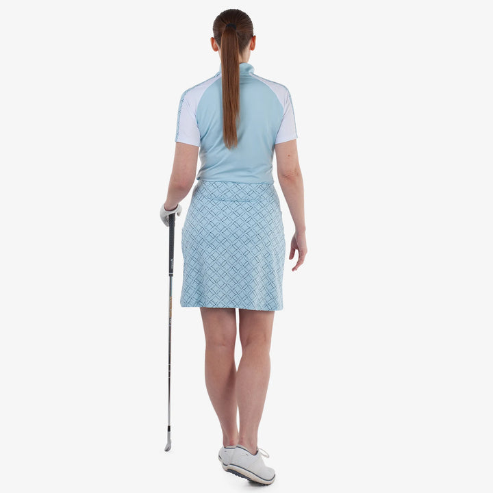 Marielle is a Breathable golf skirt with inner shorts for Women in the color Crystal Blue/Navy(5)