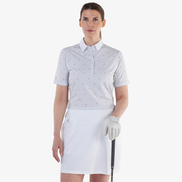 Marlene is a Breathable short sleeve golf shirt for Women in the color Sand/White(1)