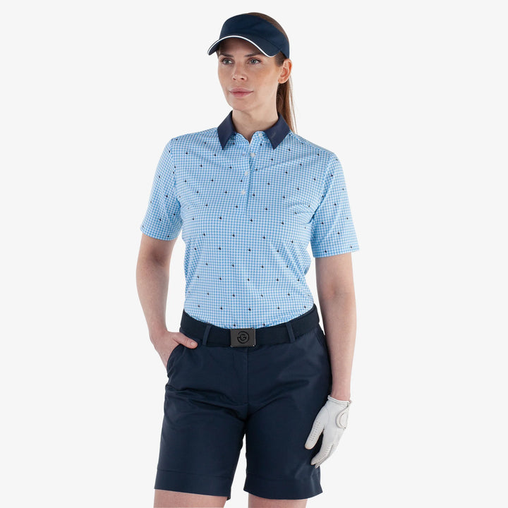 Marlene is a Breathable short sleeve golf shirt for Women in the color Alaskan Blue/White(1)