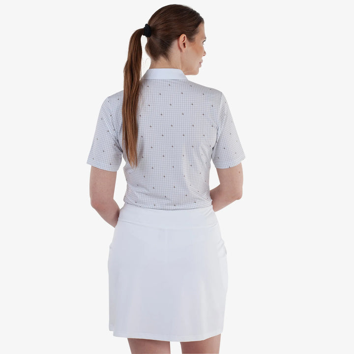 Marlene is a Breathable short sleeve golf shirt for Women in the color Sand/White(4)