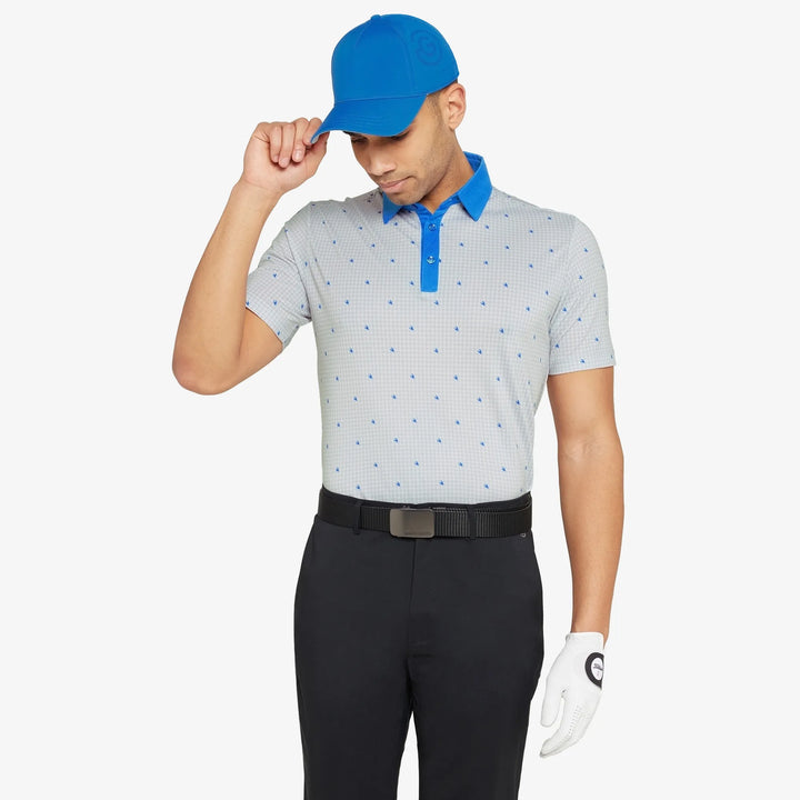 Marley is a Breathable short sleeve golf shirt for Men in the color White/Royal Blue(1)