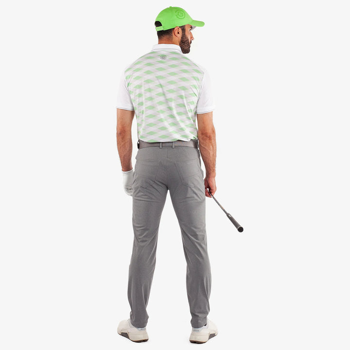 Marlon is a Breathable short sleeve golf shirt for Men in the color White/Fresh Green(6)