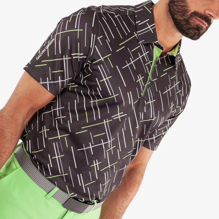 Mathias is a Breathable short sleeve golf shirt for Men in the color Black/Fresh Green(3)