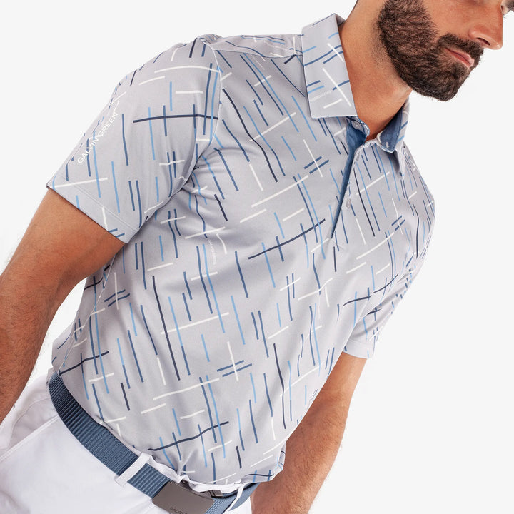 Mathias is a Breathable short sleeve golf shirt for Men in the color Cool Grey/Navy(3)