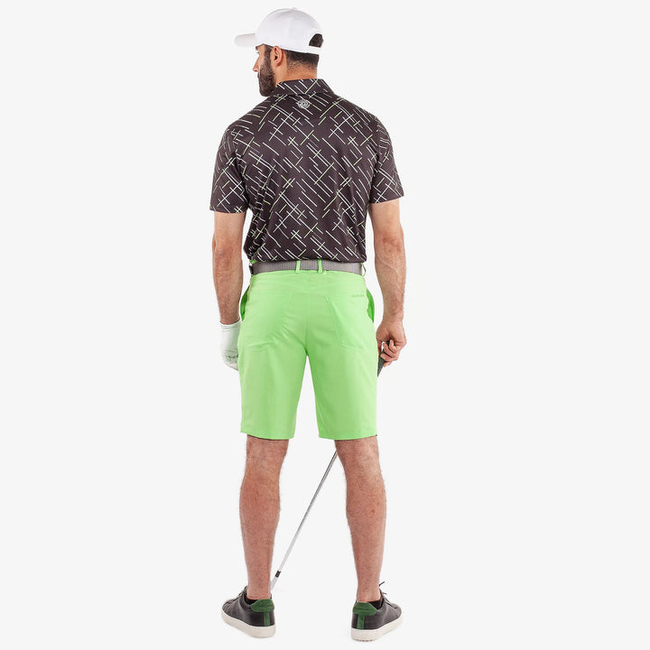 Mathias is a Breathable short sleeve golf shirt for Men in the color Black/Fresh Green(6)