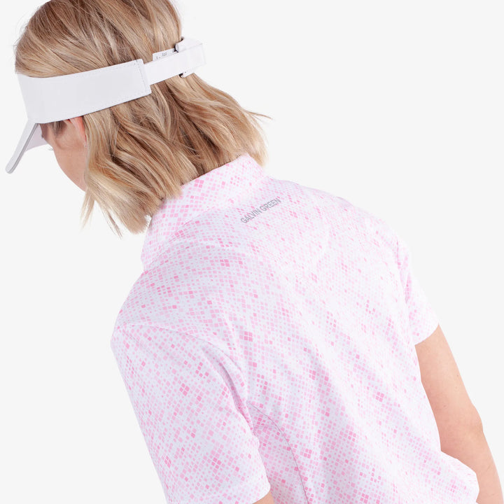 Maud is a Breathable short sleeve golf shirt for Women in the color White/Camelia Rose(5)