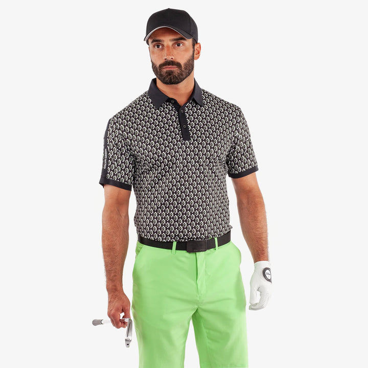 Maxwell is a Breathable short sleeve golf shirt for Men in the color Black/Fresh Green(1)