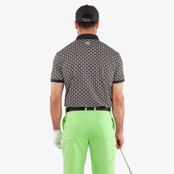 Maxwell is a Breathable short sleeve golf shirt for Men in the color Black/Fresh Green(4)