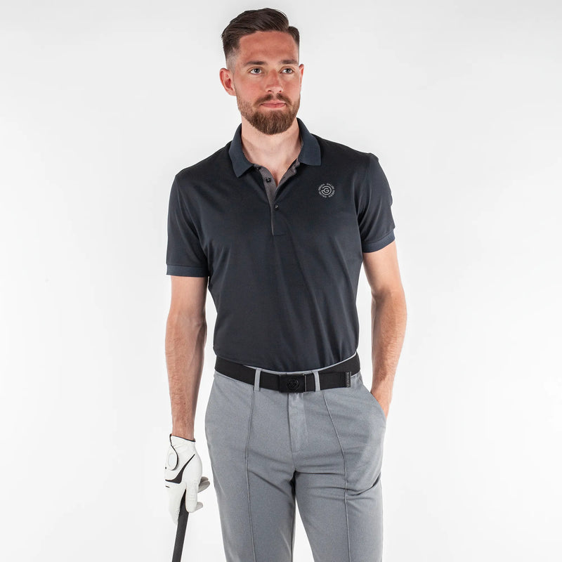 Max Tour is a Breathable short sleeve golf shirt for Men in the color Black(1)