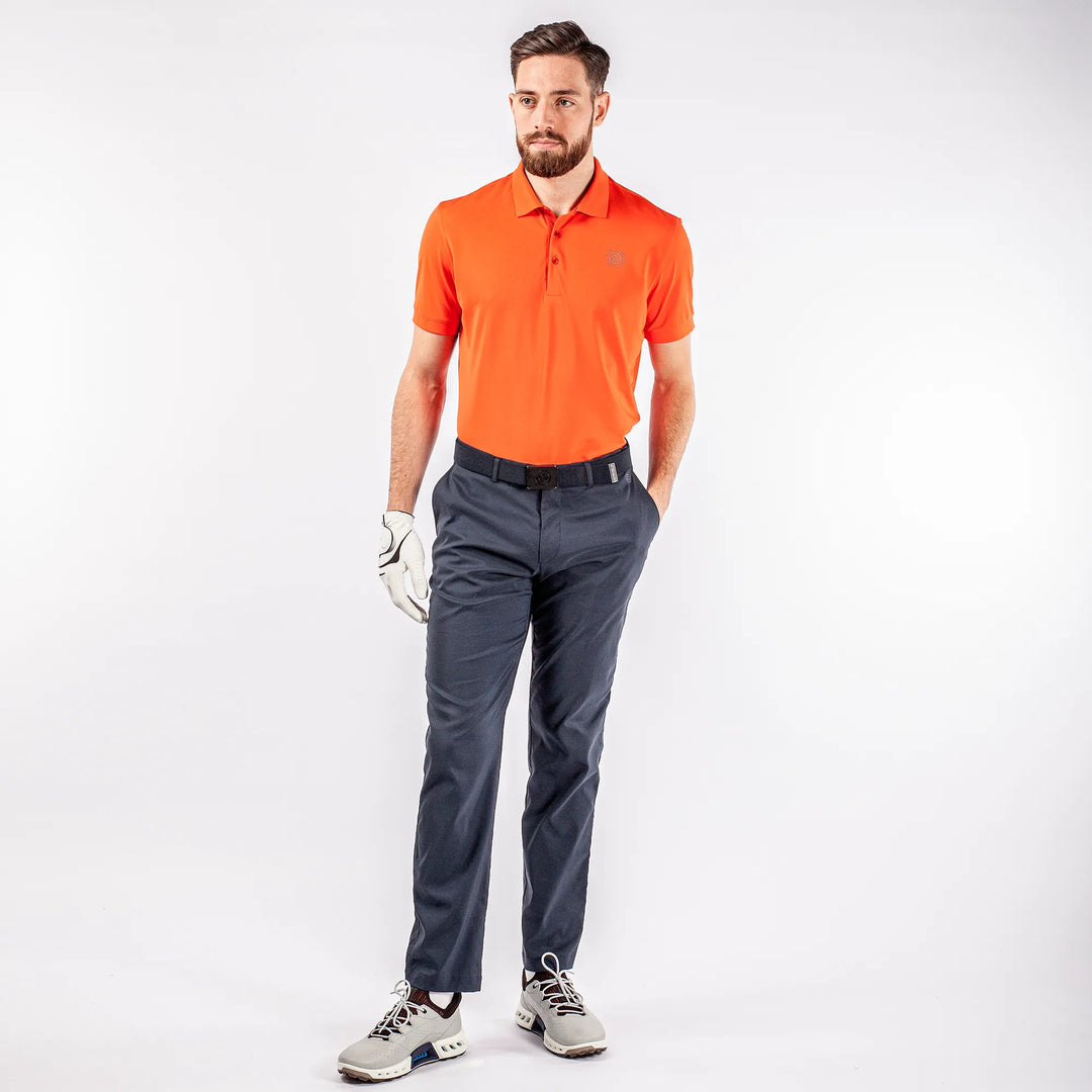 Max Tour is a Breathable short sleeve golf shirt for Men in the color Orange(2)