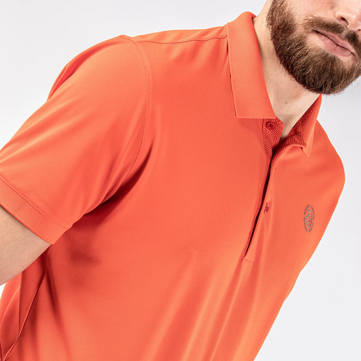 Max Tour is a Breathable short sleeve golf shirt for Men in the color Orange(3)